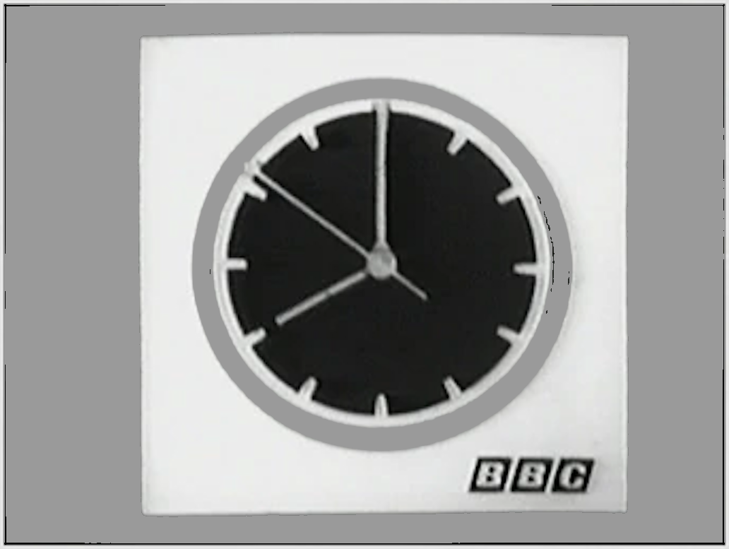 A black and white clock

Description automatically generated with medium confidence